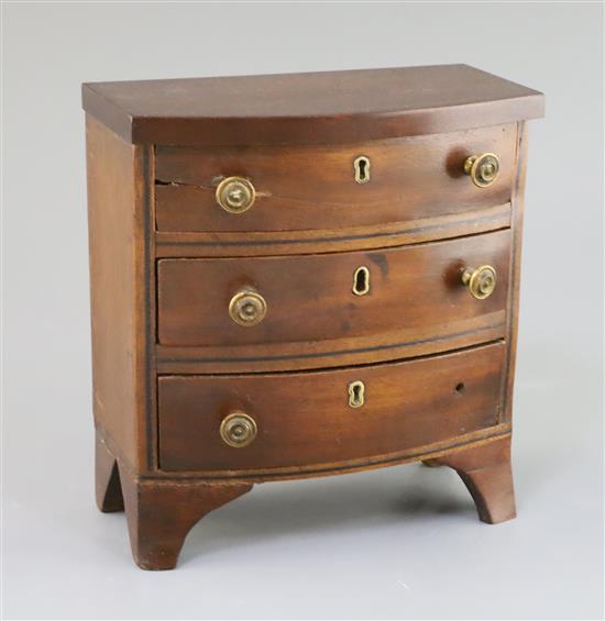 A Regency mahogany miniature bowfront chest, 7.25in., height 7.5in.
